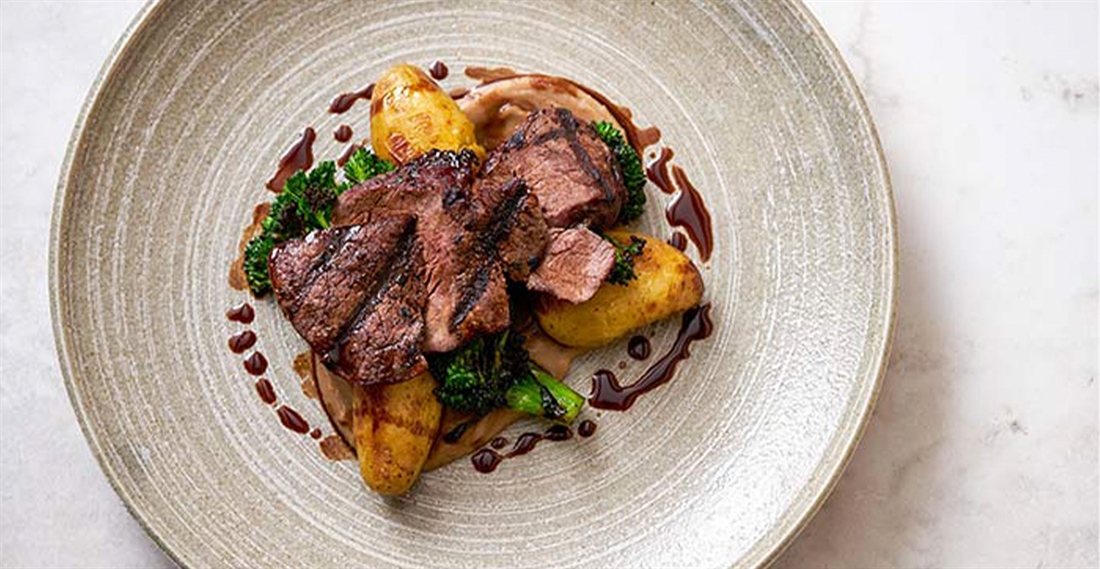 Venison haunch with roast potatoes and broccoli