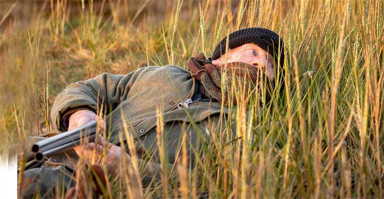 man in grass