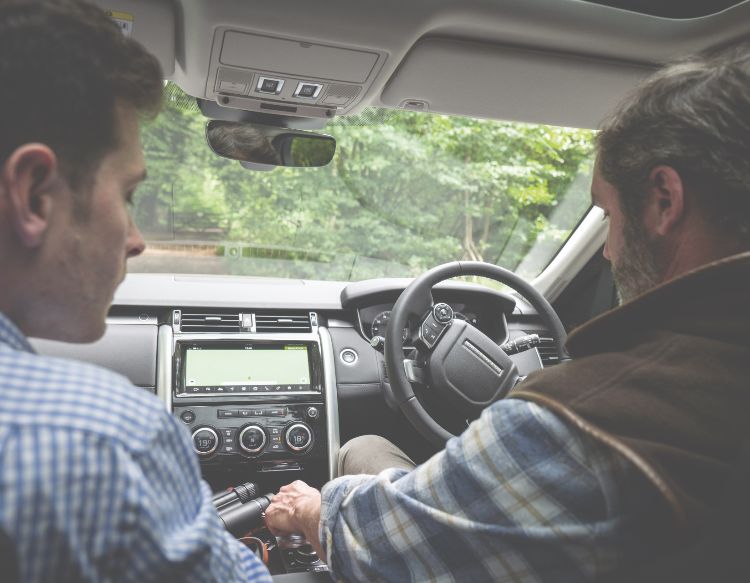 men in car 